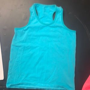 It’s a teal tank top for girl